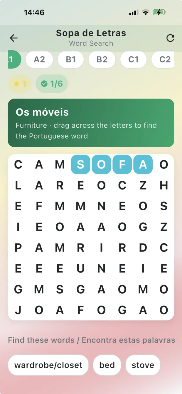 Sopa de Letras word search in the Portugal Lifestyle Pro app, showing level A1 with the furniture theme Os móveis and SOFÁ highlighted in the letter grid